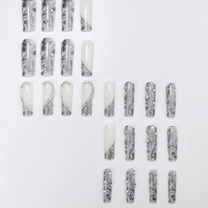 Long coffin press on nails with grey marble texture and sparkling rhinestone accents