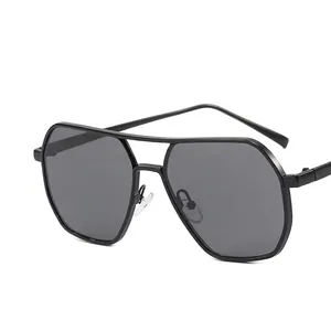 Modern black metal aviator sunglasses with a double-bridge frame and dark gray lenses