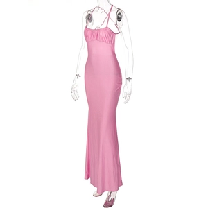 Detailed view of pink bodycon maxi dress featuring thin straps and pleated bust design