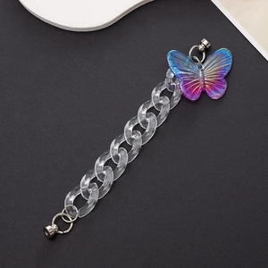 Close-up of colorful acrylic butterfly pendant and transparent wristlet chain