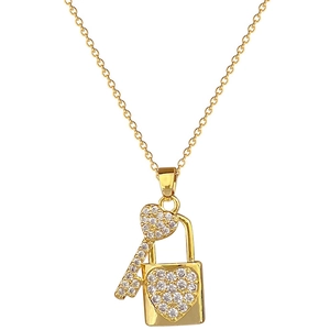 Luxurious gold titanium steel necklace featuring a sparkling crystal heart lock and key pendant