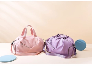 Pink and purple travel fitness bags with wet dry separation and detachable shoulder straps