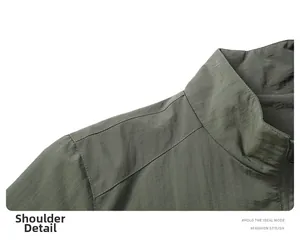 Detail view of the military green outdoor casual jacket shoulder stitching and fabric