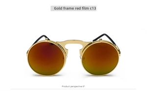 Steampunk flip-up sunglasses with round gold metal frame and red mirrored lenses