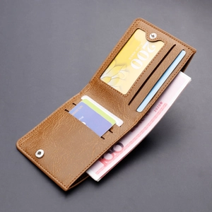 Brown faux leather bifold wallet for men featuring multiple card slots and ID window