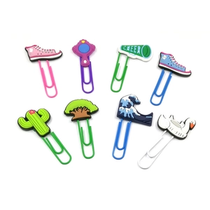 Set of 8 cute cartoon paper clips with colorful silicone shapes on white background