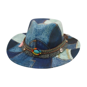 Vintage patchwork denim fedora hat with turquoise beads and bohemian tassels on white background