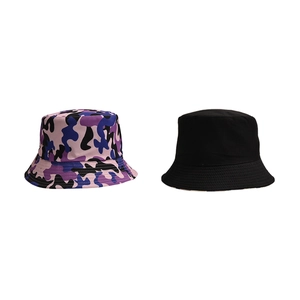 Side-by-side view of a purple camouflage bucket hat and a classic black outdoor sun hat