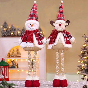Detail of telescopic Christmas plush toys featuring snowman and reindeer in red plaid outfits