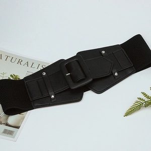 Detail of black elastic corset belt with PU leather front and square silver buckle