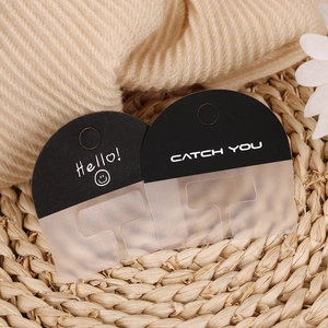 Frosted black phone lanyard patch with Hello greeting and hole for strap connection