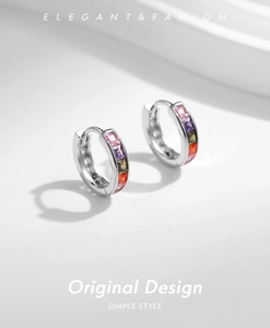 Detailed shot of silver s925 earrings featuring a row of vibrant multicolor square zircons
