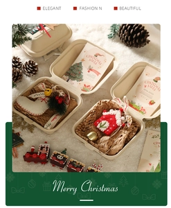 Close-up of elegant Christmas gift box with felt ornaments and festive decorations