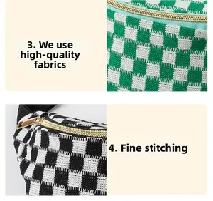 Detailed close-up of premium checkered fabric and high-quality gold metal zipper on waist bag
