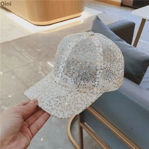 Detailed close-up of breathable mesh baseball cap with sparkling silver sequins
