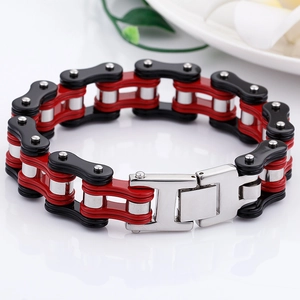 Macro shot of high-quality tricolor stainless steel bike chain bracelet with heavy clasp