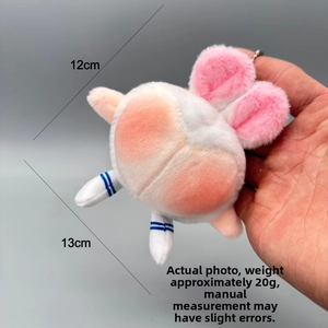 Detail view of 12cm white plush bear keychain showing soft texture and dimensions