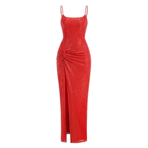 Detail of red sequin gown showing side slit and high-density glitter fabric texture