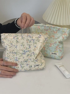 Floral canvas makeup bag with large capacity and zipper closure for travel storage