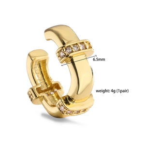 Detail showing gold ear cuff width 6.5mm and weight 4g with cubic zirconia stones