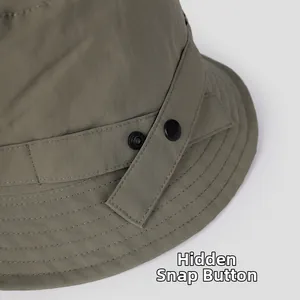 Detail of adjustable snap button on olive green nylon sun hat for custom head fit