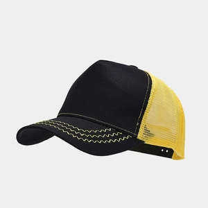 Side view of black and yellow trucker hat with mesh back and wavy brim stitching
