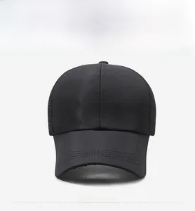 Detail of black sport baseball cap featuring mesh panels and 3D SPORT embroidery