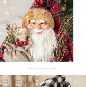 Close-up of Santa Claus doll with gold glasses and burlap sack of gifts decoration