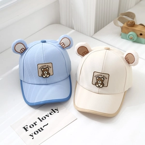 Light blue and beige baby baseball caps with 3D bear ears and cute cartoon patches