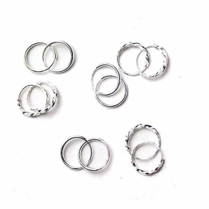 Minimalist S999 sterling silver hoop earrings set with smooth and twisted designs