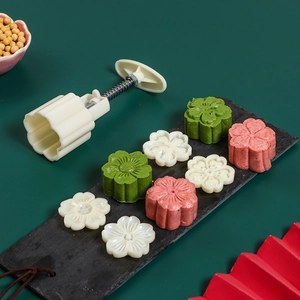Press-type mooncake mold set with various floral stamps for DIY pastry baking