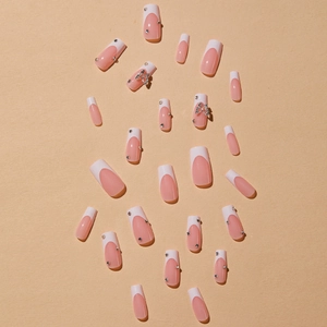 Pink jelly French press on nails with elegant silver butterfly charms and rhinestones