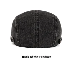Rear view of washed denim flat cap showing adjustable metal buckle and twill texture