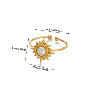 Golden sunburst open ring with central white pearl and detailed size measurements