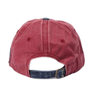 Detail of vintage washed baseball cap showing the adjustable metal buckle and blue back strap