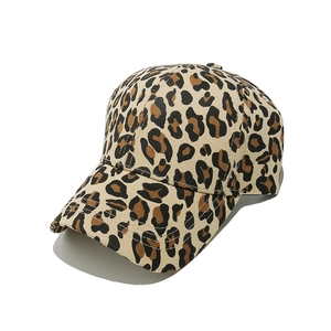 Detail of leopard print baseball cap featuring cotton twill texture and six-panel stitching
