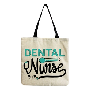 Close-up of the durable canvas texture and 'DENTAL Nurse' medical theme print on tote