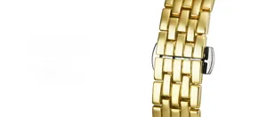 Detail of gold metal watch strap featuring a secure butterfly double snap clasp closure
