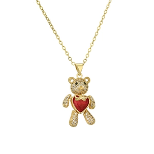 Goldene Teddybär-Halskette mit funkelndem Zirkonia und rotem Herz-Anhänger auf Weiß