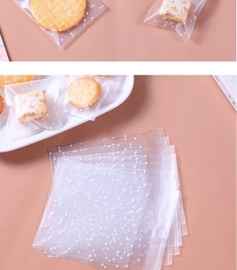 Close-up of frosted self-adhesive packaging bags with white polka dots for cookies