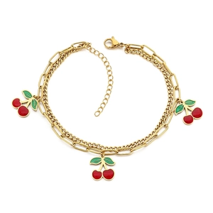 Gold double-layer stainless steel anklet with red cherry pendants and lobster clasp