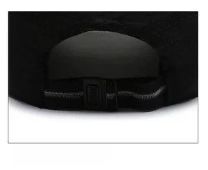 Macro view of adjustable plastic buckle and breathable mesh fabric on sports cap