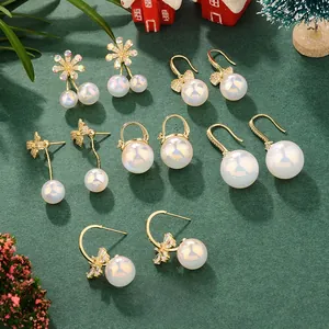 French vintage gold earrings set with pearls and crystals in festive holiday display