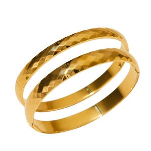 Minimalist gold plated stainless steel bangles with textured honeycomb facet design