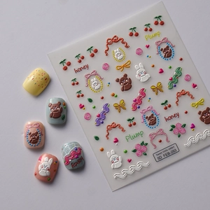 Stickers nail art 5D en relief avec lapins et nœuds 3D mignons sur un fond gris clair