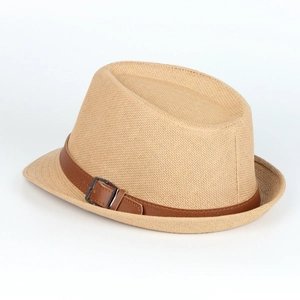 Detail of light brown straw texture with dark brown leather band and metal buckle
