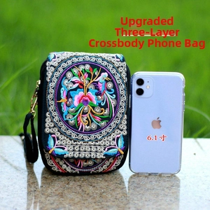 Three-layer ethnic floral embroidery phone bag compared with a 6.1-inch smartphone
