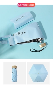 Close-up of a compact blue mini folding sun umbrella with its UPF 50+ storage case
