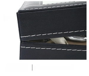 Detail of premium black leather watch box featuring elegant white contrast stitching