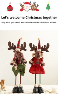 Detailed view of standing Christmas reindeer dolls in red and green festive outfits